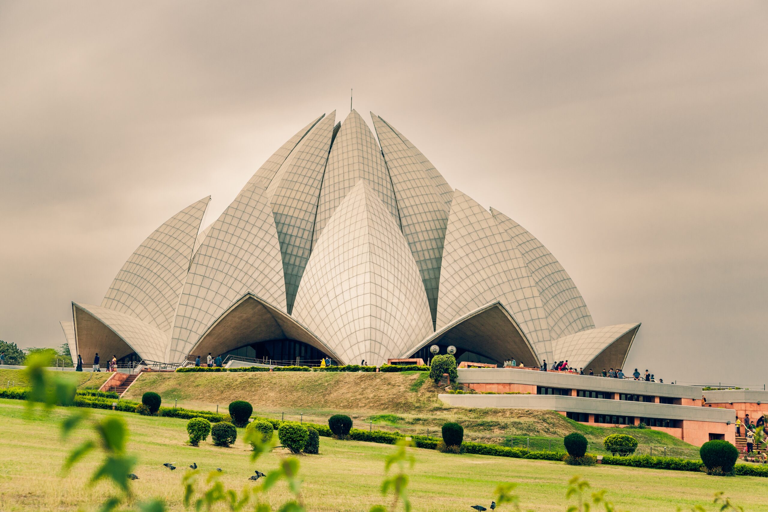 beautiful shot lotus temple delhi india cloudy sky scaled