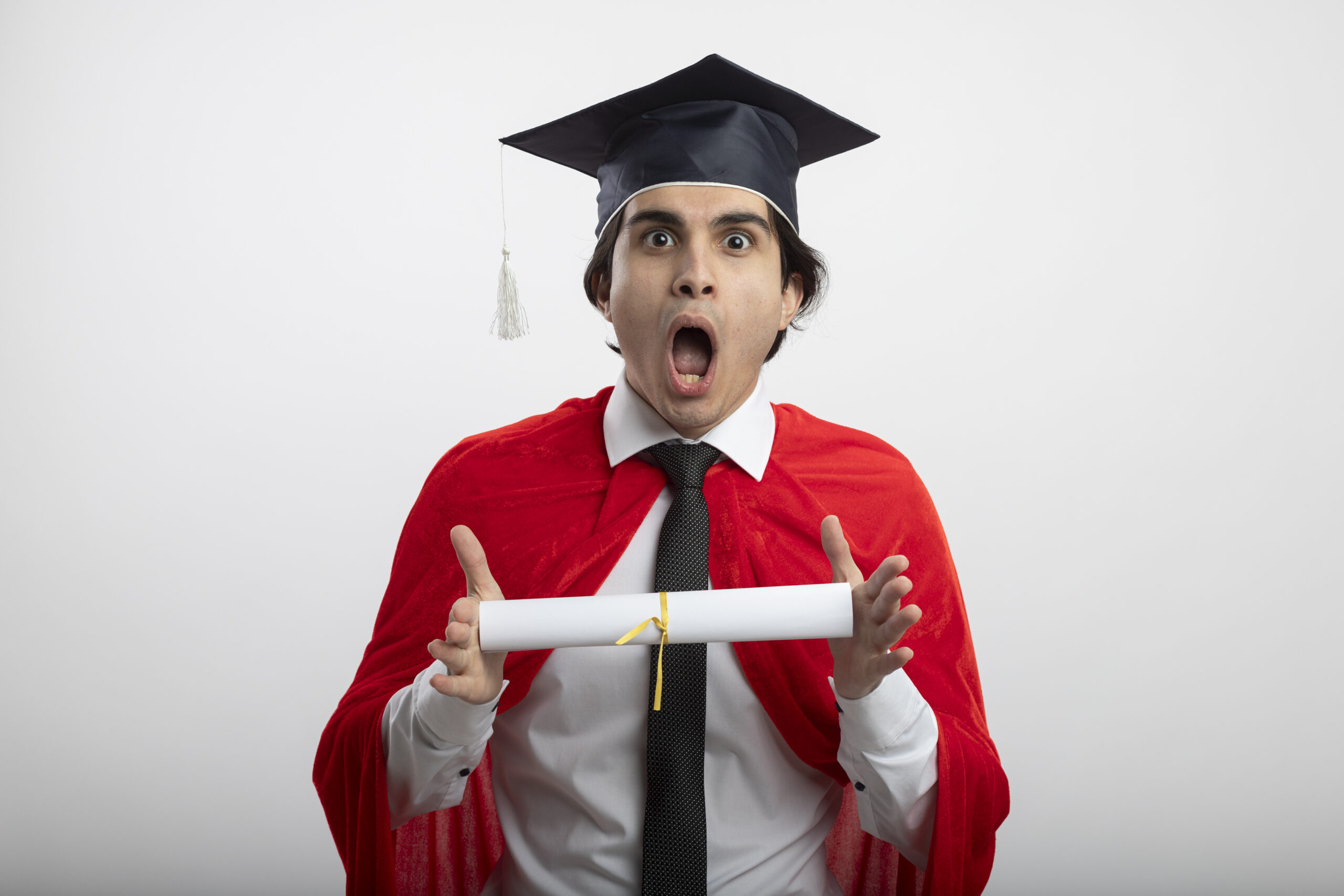 scared young superhero guy looking camera wearing tie graduate hat holding diploma isolated scaled